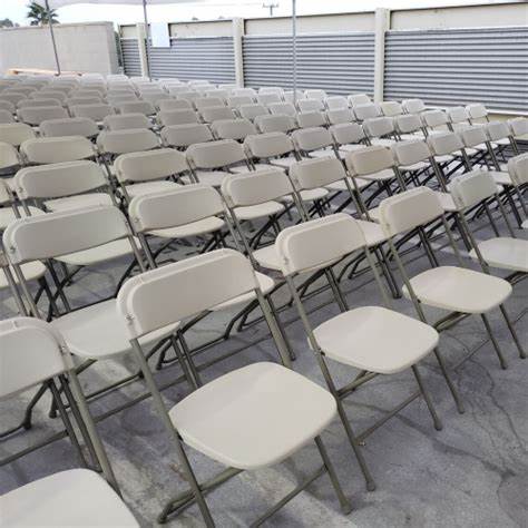Beige Plastic Folding Chairs, Sold In Boxes Of 8.